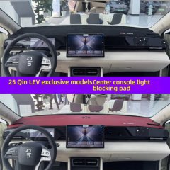 Byd qin lev 2025 exclusive center console light blocking pad, shown in black and red, protecting the dashboard from sun glare...