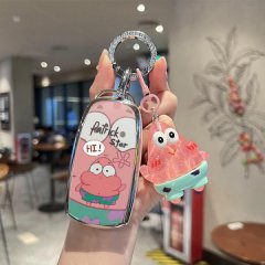 A hand holds a chery tiggo 8 pro car key cover featuring a patrick star design with a hi! speech bubble, paired with a matchi...