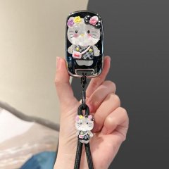 A hand holds a wuling hongguang mini ev car key cover featuring a pastel macaron-style hello kitty design with floral accents...