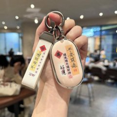 A hand holds a stylish nio es6 car key cover with elegant chinese blessings like and , featuring a sleek design and a ...
