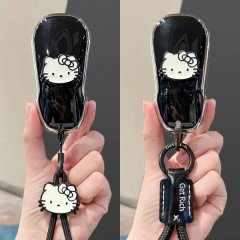 Black xpeng p7+ g6 g9 mona m03 key cover featuring a cute hello kitty design with a get rich keychain, offering stylish and u...