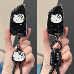 Stylish hello kitty-themed bmw car key cover for 3 series, 5 series, x3, x5, x1, i3, and 7 series, featuring a sleek carbon f...