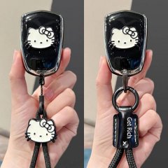 Black cadillac xt5 key cover featuring a hello kitty design with a matching lanyard and get rich tag, perfect for car enthusi...