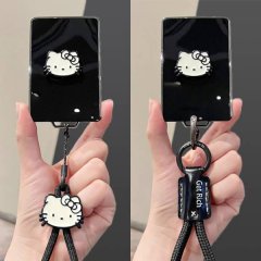Xpeng mona m03 key cover featuring a hello kitty design with a sleek black silicone case and matching keychain, perfect for 2...