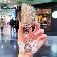 Elegant key cover for dongfeng aeolus l7, sky ev01, and haoji 2023, featuring a sparkling design with butterfly charm and fre...