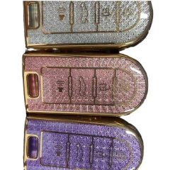 Three elegant north deer large car key covers in silver, pink, and purple, featuring intricate patterns and gold accents for ...