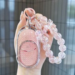 Elegant nio es6 et5 et7 key cover with sparkling pink design and beaded keychain, featuring premium leather card holder for s...