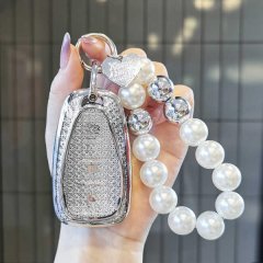 Elegant chevrolet malibu xl key cover adorned with sparkling crystals and a pearl-accented keychain, perfect for stylish car ...