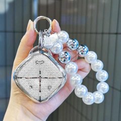Elegant wuling binguo key cover for kiwi ev & yun duo, featuring a sleek silver design with sparkling details and a pearl-acc...
