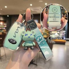 Light green kia key cover for sportage, k5, sorento, featuring a stylish design with a bear charm and front view details.