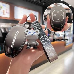 Gs3 shadow speed keycase for 2023 gac trumpchi, featuring a sleek black design with a playful bear keychain and front view of...
