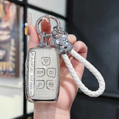 Elegant land rover key cover for range rover sport & evoque, featuring a sleek metallic design with a braided white rope and ...