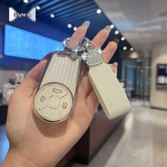Elegant style a ora good cat gt key cover featuring a textured silver design and a sleek leather strap, perfect for protectin...