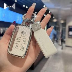 Elegant land rover jaguar key cover with premium leather and sparkling details, designed for stylish protection of your vehic...