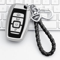 Elegant lincoln key cover for aviator, corsair, mkc, mkz & navigator, featuring a sleek metallic design and braided leather k...
