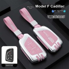 Pink and silver cadillac key cover for ct5, ct6, xt5, xt6, and more, featuring a wrist strap and stylish design. perfect for ...