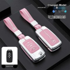 Changan key cover in soft corn-yellow pu leather, featuring a sleek metal buckle design and cherry blossom pink accents, comp...