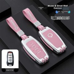 Pink and silver gwm cannon key cover with wristband, designed for commercial/off-road editions, shown before and after effect...