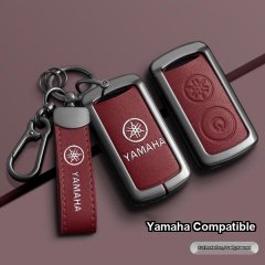 Elegant red leather key cover for yamaha nmax155/xmax300, featuring a sleek design with embossed yamaha logo and full protect...