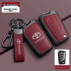 Red leather toyota key cover with gunmetal accents, featuring a matching strap and clip, designed for camry, corolla, rav4, a...