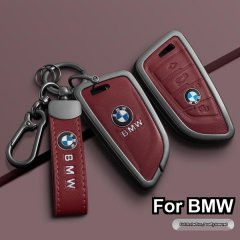 Elegant red leather key cover for bmw 530li and 325li, featuring a sleek design with the iconic bmw logo, offering full prote...