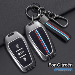 Protect your citroen key with a sleek, full-quality metal cover featuring red, blue, and white stripes, designed for models l...