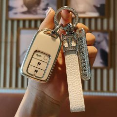 Elegant honda key cover with a sleek design, featuring a leather strap and decorative keychain, perfect for xrv, cr-v, civic,...