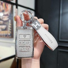 Elegant land rover key cover for range rover evoque & discovery, featuring a sleek silver design with a glittery texture and ...