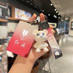 A hand holds a hongqi hs7 hs5 card key cover featuring a gradient red design with a white emblem and chinese characters, acco...
