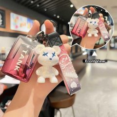 Front view of a stylish tank 300 key cover featuring a cute bear charm and gradient design, perfect for the 2024 haval cyber ...