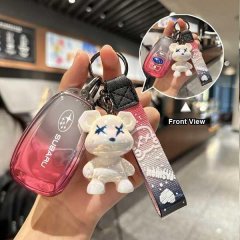 Subaru key cover with a cute bear charm, featuring a gradient pink design and front view details for models like forester, ou...