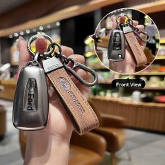 Ford key cover for mondeo, focus, edge & explorer, featuring a sleek metallic design and leather strap with ford motor brandi...