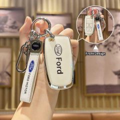 Ford key cover for focus, mondeo, escape & explorer, featuring a sleek white design with the ford logo and a matching key fob...