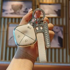 Elegant wuling hongguang mini ev key cover with a sleek white design and diamond-embellished keychain, perfect for 2023 kiwi ...