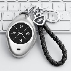 Xiaopeng p7 silicone key cover 2022 featuring a sleek silver design with a braided leather keychain, displayed on a modern ke...
