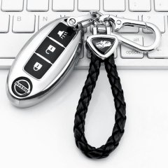 Elegant nissan key cover for altima, sentra, x-trail, and more, featuring a sleek design with a braided leather keychain and ...