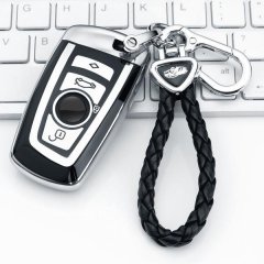 Premium leather bmw key cover for 5 series, 3 series, x3, x4, x5, and x6, featuring a sleek design and braided strap.
