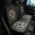 Camellia ice silk car seat cushion featuring a honeycomb cooling design with elegant white floral patterns on a black mesh fa...