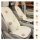 Puff & co. all-season car seat cushion featuring a quilted design with decorative floral accents, providing non-slip and brea...