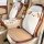 Cute puppy-themed ice silk seat cushion with non-slip design, offering soft comfort for all seasons in a car interior.
