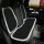 Black bow plush seat cushions with white trim, providing warmth and comfort for winter use in a car.