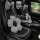 Elegant black and white houndstooth car seat cushions with plush bows, offering winter warmth and antifreeze comfort for a co...