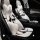 Elegant bow-tie winter cushion featuring plush white bows and a stylish black-and-white pattern, designed for non-slip comfor...