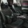 Elegant black chanel-inspired car headrest and lumbar pillow set, featuring bow accents and textured fabric for enhanced comf...