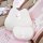 Cute tulip bunny memory foam car headrest pillow with soft white and pink design, featuring adorable bunny embroidery and flo...
