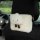 Cute lamb wool cartoon car tissue box cover with a fluffy cloud design and smiling face, perfect for adding charm to your veh...