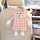 Cute little monster car tissue box holder with plush design, adorable pink and white checkered pattern, perfect for adding fu...