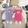 Cute little monster plush car tissue box with striped designs and playful faces, hanging on a car seat for easy access.