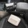 Elegant black and cream leather car tissue box armrest covers, featuring quilted designs for a luxurious touch in your vehicl...