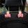 Elegant red and white checkered bow car hooks for stylish, functional storage on car headrests.